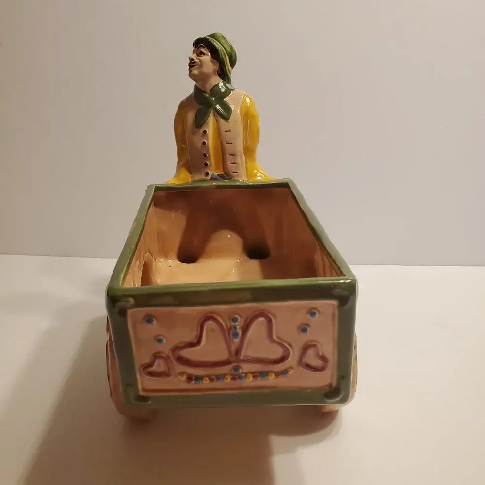 Brayton Laguna man with flower cart planter figure